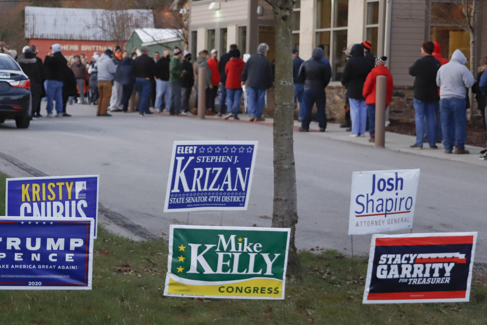 FILE - In this Nov. 3, 2020, file photo, people line up completely surrounding the Jackson Township Municipal Building, before the polls open for Election Day in Jackson Township, Pa. State Sen. Doug Mastriano, R-Franklin, said in a statement Wednesday, July 7, 2021, that, as chair of the Senate Intergovernmental Operations Committee, he issued letters to several counties, requesting "information and materials needed to conduct a forensic investigation of the 2020 General Election and the 2021 Primary." (AP Photo/Keith Srakocic, File)