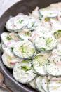 <p>This refreshing salad is made with English cucumbers—the seedless variety with thin skins that don’t need to be peeled. It’s creamy, tangy, and perfect for BBQs or picnics. </p><p><strong>Get the recipe at <a href="https://www.jessicagavin.com/creamy-cucumber-salad/" rel="nofollow noopener" target="_blank" data-ylk="slk:Jessica Gavin;elm:context_link;itc:0;sec:content-canvas" class="link ">Jessica Gavin</a>. </strong></p><p><a class="link " href="https://go.redirectingat.com?id=74968X1596630&url=https%3A%2F%2Fwww.walmart.com%2Fsearch%2F%3Fquery%3Dpioneer%2Bwoman%2Bcutting%2Bboard&sref=https%3A%2F%2Fwww.thepioneerwoman.com%2Ffood-cooking%2Fmeals-menus%2Fg36353420%2Ffourth-of-july-side-dishes%2F" rel="nofollow noopener" target="_blank" data-ylk="slk:SHOP CUTTING BOARDS;elm:context_link;itc:0;sec:content-canvas">SHOP CUTTING BOARDS</a></p>