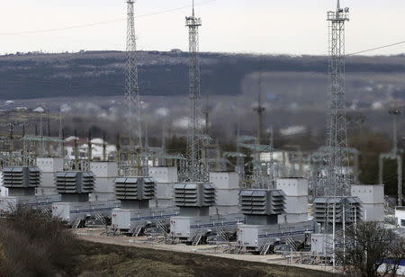 A general view shows the facilities of a mobile gas turbine generator, which was turned on due to recent power outages after pylons carrying electricity were blown up, in the settlement of Stroganovka, Simferopol district of Crimea, in this November 22, 2015 file photo. REUTERS/Pavel Rebrov/Files