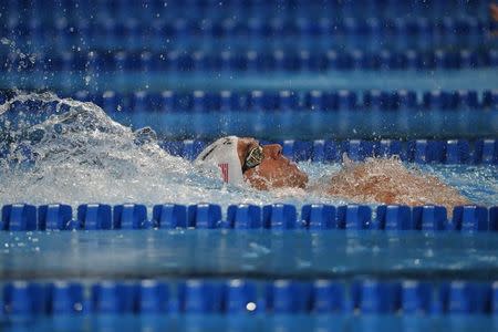 Jun 30, 2016; Omaha, NE, USA; Michael Phelps swims during the Men's 200 Meter Individual Medley semi-finals in the U.S. Olympic swimming team trials at CenturyLink Center. Mandatory Credit: Erich Schlegel-USA TODAY Sports