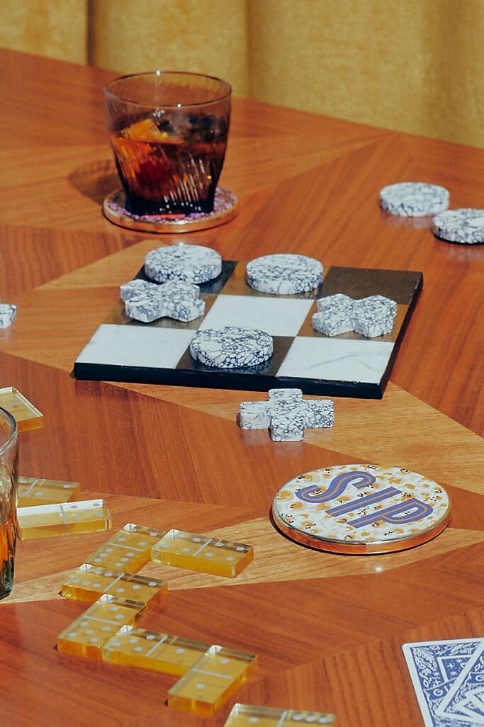 Yeah, they might be bored of "Monopoly" by now. But they could try their hand at dominoes. This gold lucite set is something that they'll want to show off &mdash; especially since these dominoes are described as "heirloom-worthy." <a href="https://fave.co/37XrTBF" target="_blank" rel="noopener noreferrer">Find it for $120 at Anthropologie</a>.