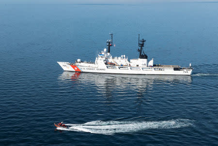 The Coast Guard Cutter Midgett, a 378-foot high-endurance cutter homeported in Seattle, transits the Strait of Juan de Fuca enroute to Seattle, Washington, U.S. in this October 13, 2015. Petty Officer 1st Class Levi Read/U.S. Coast Guard/Handout via REUTERS