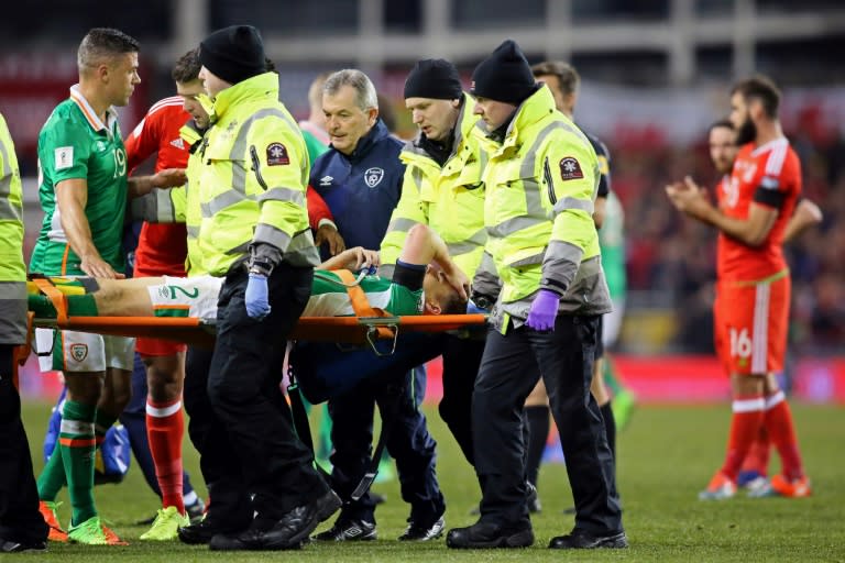 Republic of Ireland's defender Seamus Coleman is taken from the pitch on a stretcher after being injured during the World Cup 2018 qualification football match against Wales