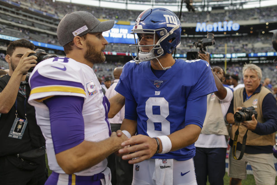 Minnesota Vikings quarterback Kirk Cousins (8) and New York Giants quarterback Daniel Jones (8) talk after playing each other in an NFL football game, Sunday, Oct. 6, 2019, in East Rutherford, N.J. (AP Photo/Adam Hunger)