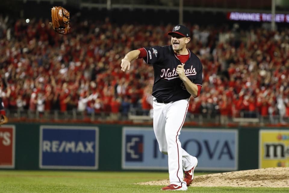 Washington Nationals' Daniel Hudson celebrates after Game 4 of the baseball National League Championship Series Tuesday, Oct. 15, 2019, in Washington. The Nationals won 7-4 to win the series 4-0. (AP Photo/Jeff Roberson)