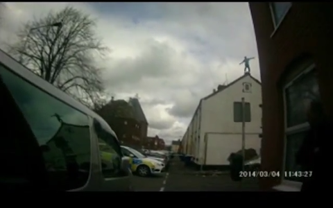 A man high on 'Monkey Dust' prepares to jump off a house and onto a car bonnet below - Credit: Staffordshire Police