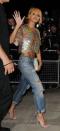 <p> Rihanna has made her love for boyfriend jeans clear. She paired this glitzy Stella McCartney top with a distressed pair. </p>