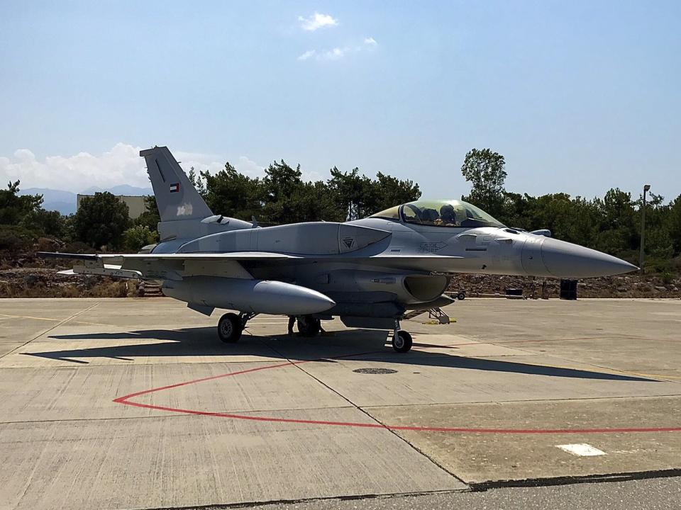 In this photo provided by the Greek Defense Ministry, an air force jet from the United Arab Emirates arrives at the airbase of Souda to take part in a joint training with Greek forces, on the southern island of Crete, Greece, on Thursday, Aug. 27, 2020. Germany's foreign minister on Thursday called for an end to military drills in the eastern Mediterranean to defuse tensions and create conditions for NATO allies Greece and Turkey to resolve a dispute over offshore energy exploration rights. (Greek Defense Ministry via AP)