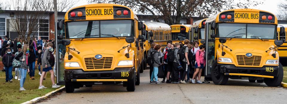 Students load onto Autauga County school buses at Prattville Junior High School in Prattville, Ala., on Thursday January 6, 2022