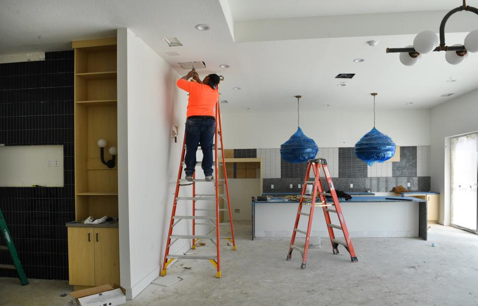 Construction workers are putting the finishing touches on the club house at Cypress Square. The Sarasota Housing Authority is nearing completion on Cypress Square, a three-building, an affordable housing project consisting of 84 units and a clubhouse in the 1600 block of 21st in Sarasota.