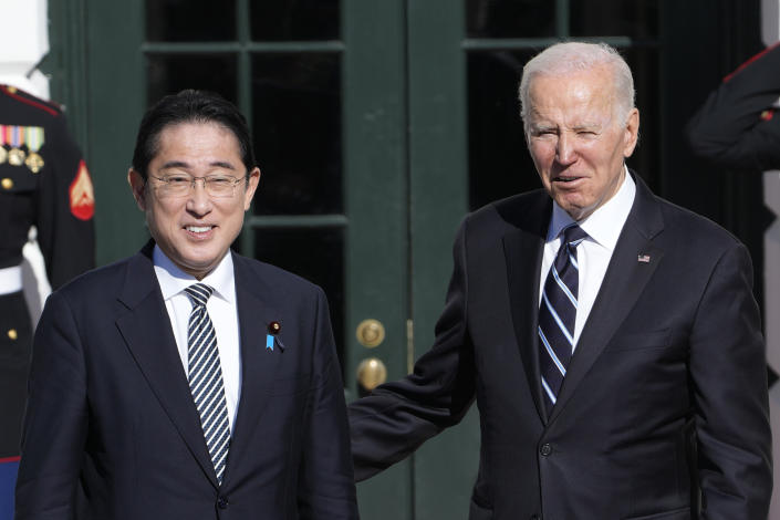 FILE - President Joe Biden greets Japanese Prime Minister Fumio Kishida on the South Lawn of the White House in Washington, Friday, Jan. 13, 2023. Biden has an ambitious agenda when he sets off later this week on an eight-day trip to the Indo-Pacific. Biden first heads to Hiroshima for the Group of Seven summit. Japanese Prime Minister Fumio Kishida is this year's host of the gathering of leaders from seven of the world's biggest economies and picked his hometown of Hiroshima. (AP Photo/Susan Walsh, File)