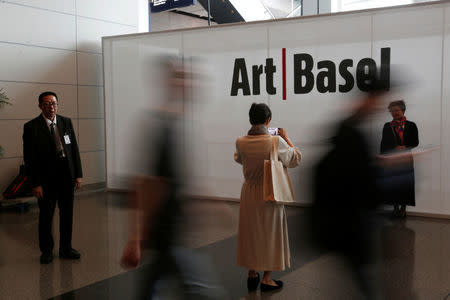 Guests attend the preview of Art Basel Hong Kong in Hong Kong, China March 27, 2018. REUTERS/Bobby Yip