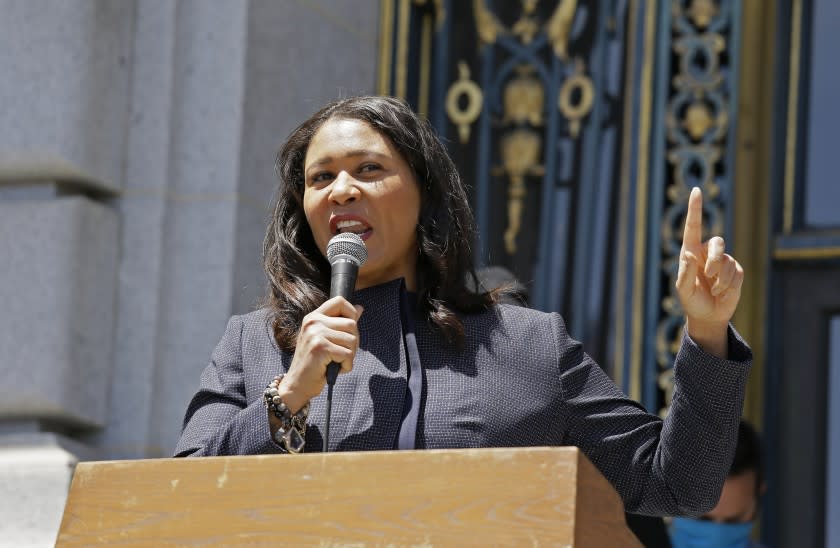 FILE - In this June 1, 2020, file photo, San Francisco Mayor London Breed speaks outside City Hall in San Francisco. Breed joined a chorus of officials who have denounced the tweets by the vice president of San Francisco's school board, Alison Collins, as racist and anti-Asian. Collins is under fire for tweets she wrote in 2016 that said Asian Americans use "white supremacist" thinking to get ahead and were racist toward Black students. (AP Photo/Eric Risberg, File)