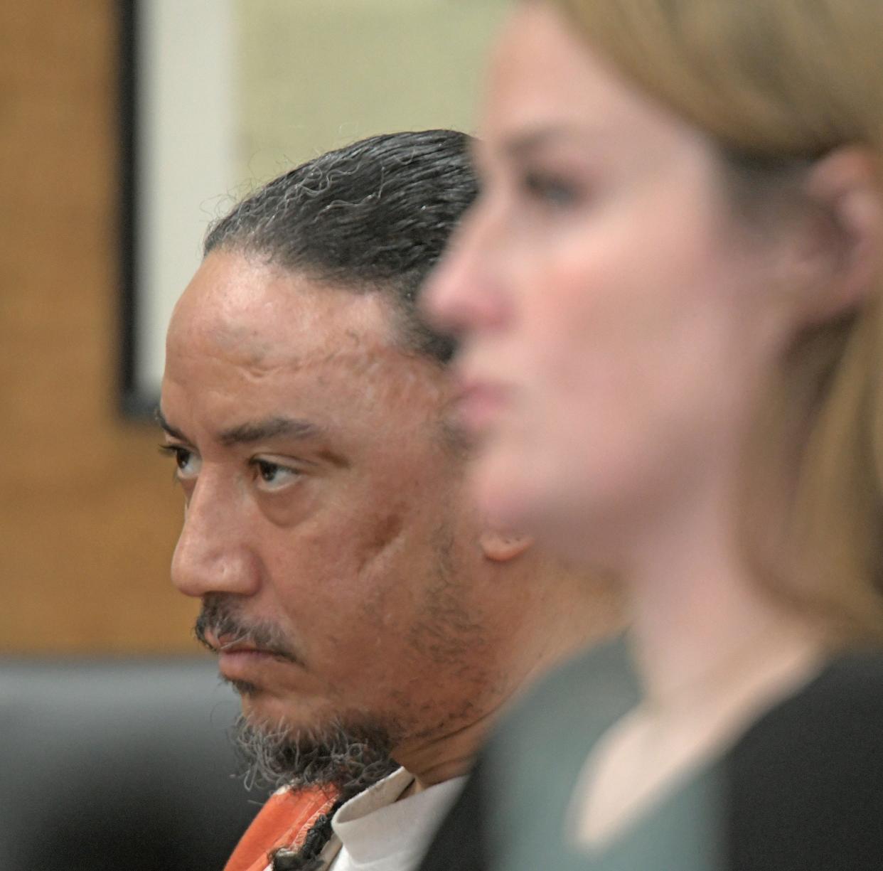 LJ Harris and attorney Jennifer Harmon listen to Judge Brent Robinson during sentencing Wednesday afternoon.
