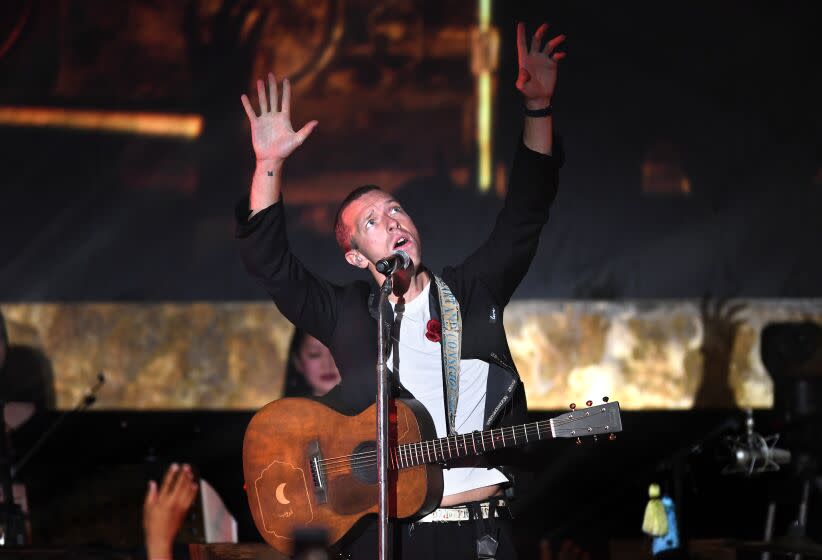 LOS ANGELES, CALIFORNIA JANUARY 21, 2020-Coldplay lead singer Chris Martin performs during a benefit concert at the Palladium Monday night. (Wally Skalij/Los Angeles Times)