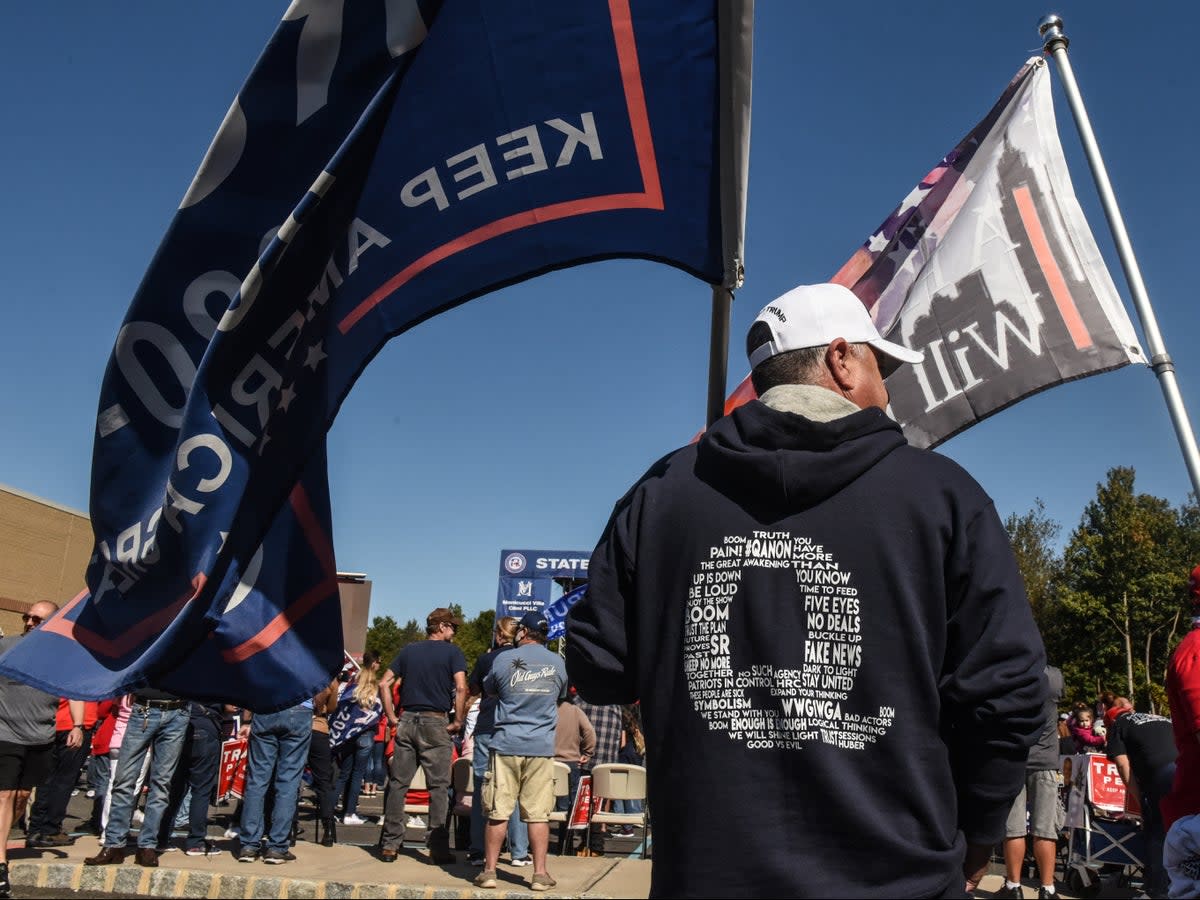 The QAnon movement has splintered since Donald Trump’s electoral defeat (Stephanie Keith/Getty Images)