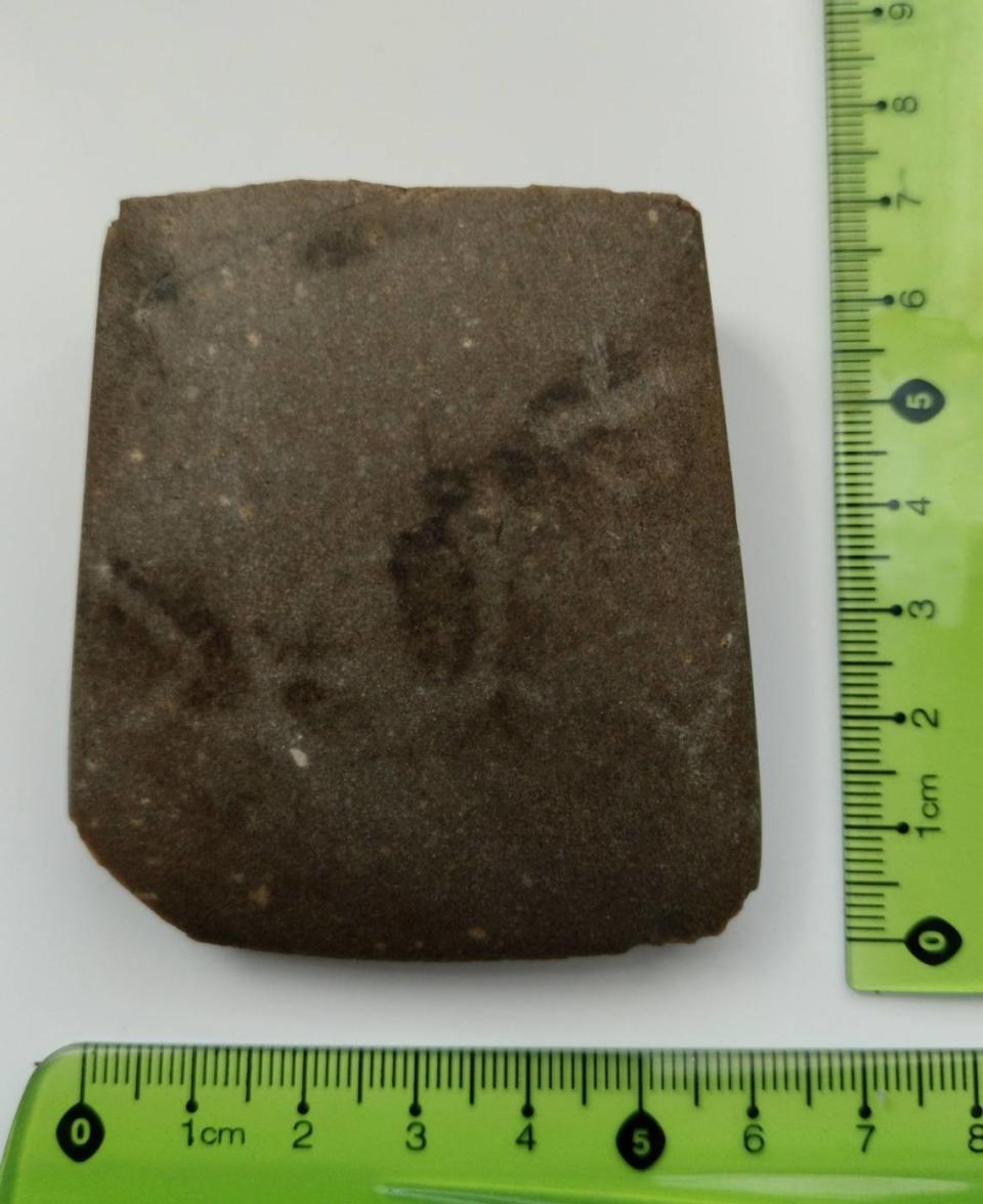 The 4,500-year-old ax fragment as seen from the side.