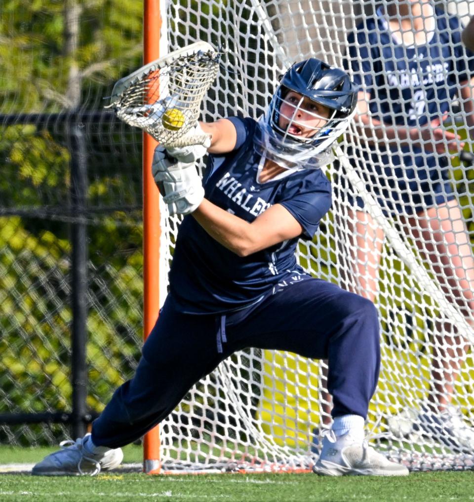 Nantucket goalie Claire Misurelli stops a Nauset shot.