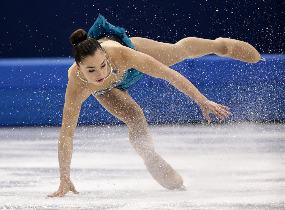 Gabrielle Daleman of Canada falls as she competes in the women's free skate figure skating finals, at the Iceberg Skating Palace during the 2014 Winter Olympics, Feb. 20, 2014, in Sochi, Russia.