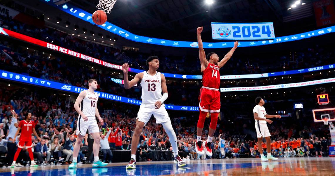 N.C. State’s Casey Morsell (14) celebrates after Michael O’Connell made a buzzer-beat to tie the game at the end of regulation during N.C. State’s 72-65 overtime victory over Virginia in the semifinals of the 2024 ACC Men’s Basketball Tournament at Capital One Arena in Washington, D.C., Friday, March 15, 2024. Ethan Hyman/ehyman@newsobserver.com