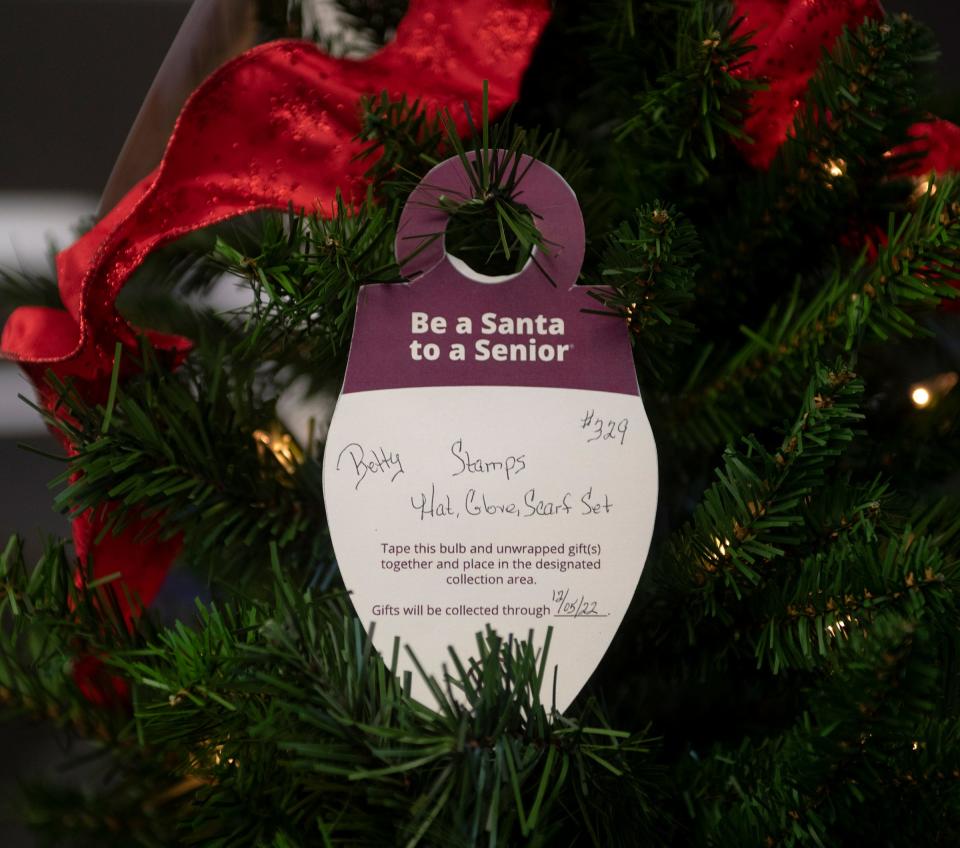 An ornament with a small wish list for a senior named Betty.