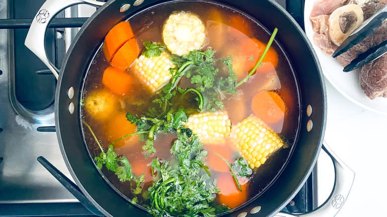 veggies in caldo de res soup pot