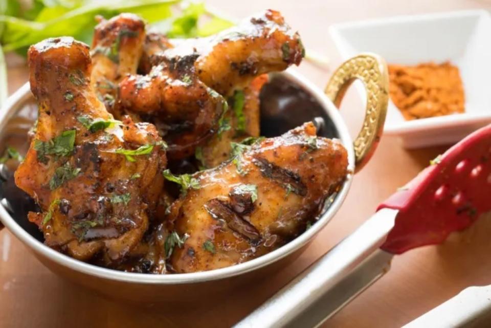 <p>Jon Ashton</p><p>Cajun seasoning and a garlic glaze give these wings an extra kick.</p><p><strong>Get the recipe: <a href="https://parade.com/842755/jonashton/cajun-chicken-wings-with-garlic-glaze/" rel="nofollow noopener" target="_blank" data-ylk="slk:Cajun Chicken Wings with Garlic Glaze;elm:context_link;itc:0;sec:content-canvas" class="link ">Cajun Chicken Wings with Garlic Glaze</a></strong></p>