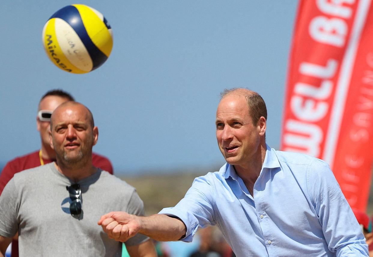 Prince William playing volleyball