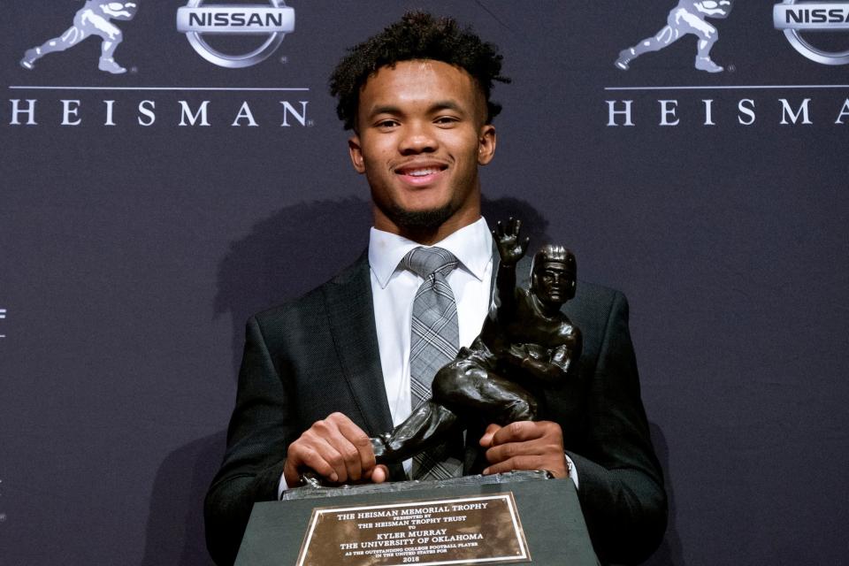 Murray collects his Heisman Trophy in New York. The previous winner, Baker Mayfield, was last year's number one pick for the Cleveland Browns