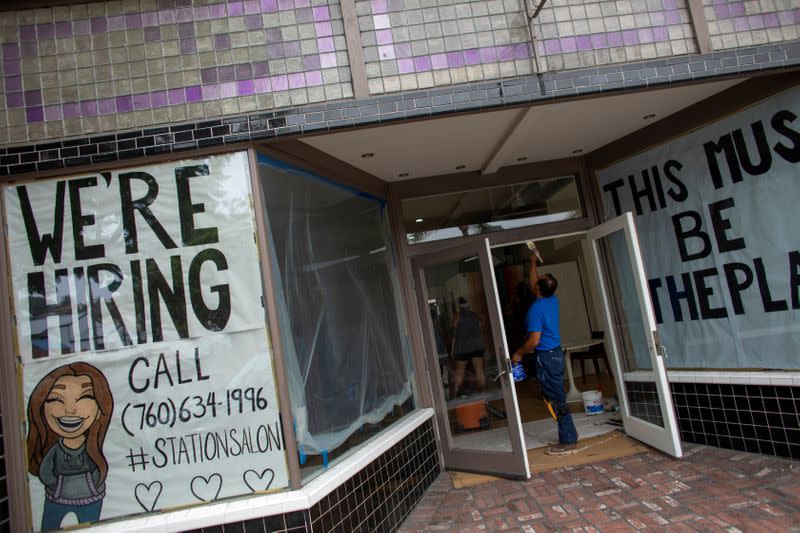 FILE PHOTO: A new business advertises for workers as it prepares to open up during the outbreak of the coronavirus disease in California,