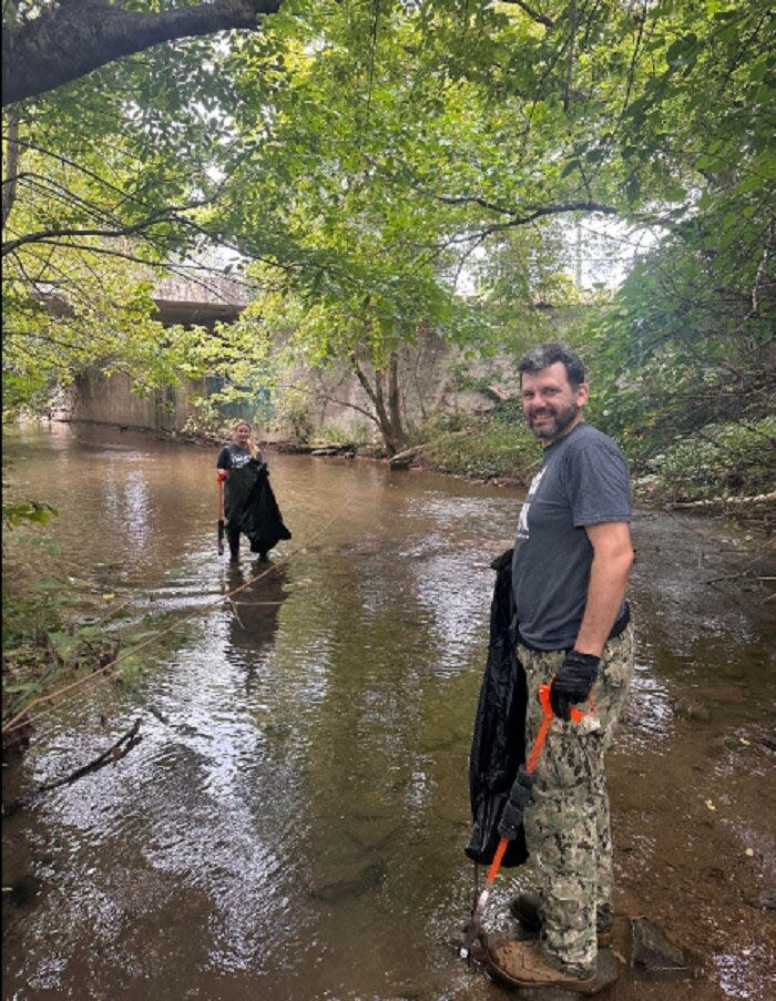 These volunteers are working in First Creek at the recent East Knoxville Community Cleanup hosted by Keep Knoxville Beautiful. Sept. 16, 2023