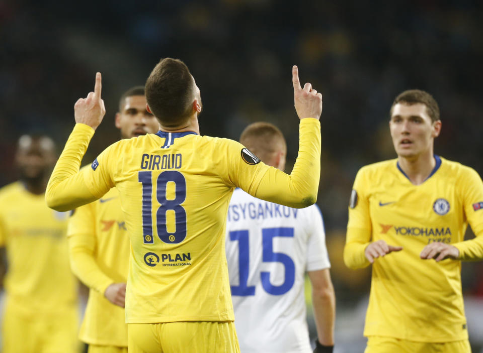 Chelsea's Olivier Giroud celebrates after scoring his side's second goal during the Europa League round of 16, second leg soccer match between Dynamo Kiev and Chelsea at the Olympiyskiy stadium in Kiev, Ukraine, Thursday, March 14, 2019. (AP Photo/Efrem Lukatsky)