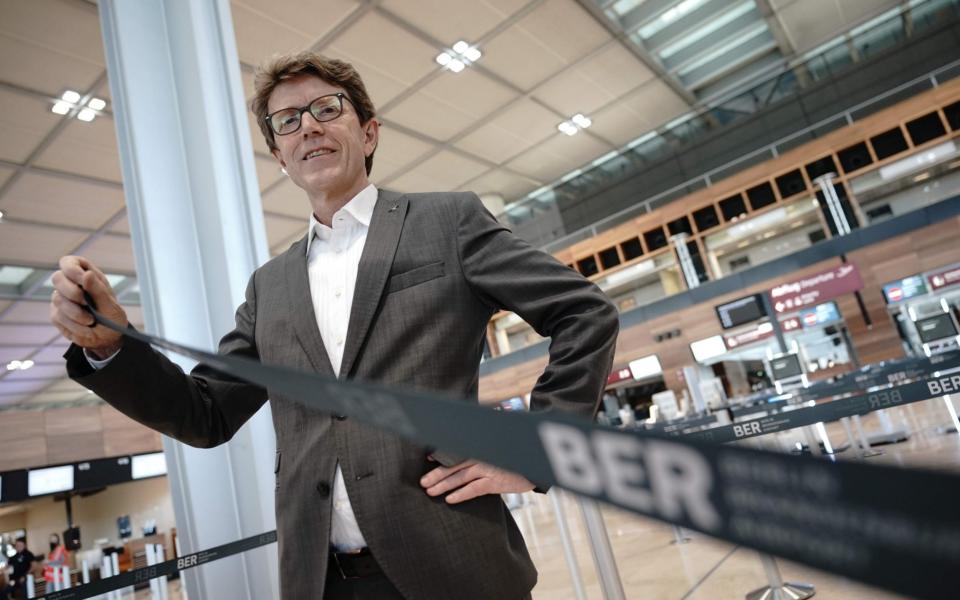 Engelbert Luetke-Daldrup, head of BER airport, poses inside the terminal 1 of the Berlin-Brandenburg Willy-Brandt international Airport - MICHAEL KAPPELER /AFP