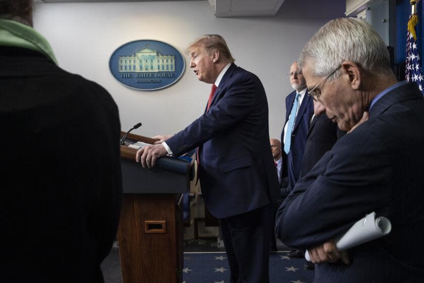 President Donald Trump speaks about the coronavirus accompanied by Dr. Deborah Birx, White House coronavirus response coordinator, left, Centers for Disease Control and Prevention Director Dr. Robert Redfield, and Dr. Anthony Fauci, director of the National Institute of Allergy and Infectious Diseases, in the James Brady Press Briefing Room of the White House, Thursday, April 16, 2020, in Washington. (AP Photo/Alex Brandon)