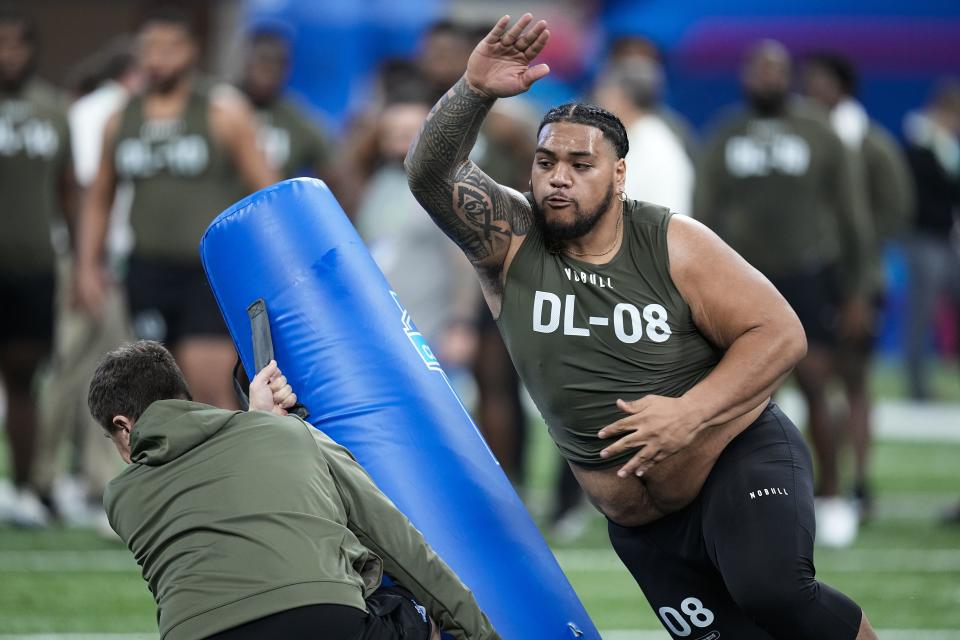 Baylor defensive lineman Siaki Ika runs a drill at the NFL football scouting combine in <a class="link " href="https://sports.yahoo.com/nfl/teams/indianapolis/" data-i13n="sec:content-canvas;subsec:anchor_text;elm:context_link" data-ylk="slk:Indianapolis;sec:content-canvas;subsec:anchor_text;elm:context_link;itc:0">Indianapolis</a>, Thursday, March 2, 2023. | Darron Cummings, Associated Press