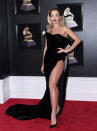 <p>Rita Ora demonstrated how to work the thigh-high split trend Hollywood’s A-listers keep insisting on donning. The singer chose a cold-shoulder gown by Ralph and Russo and finished the look with a bold, wintry lip. <em>[Photo: Getty]</em> </p>