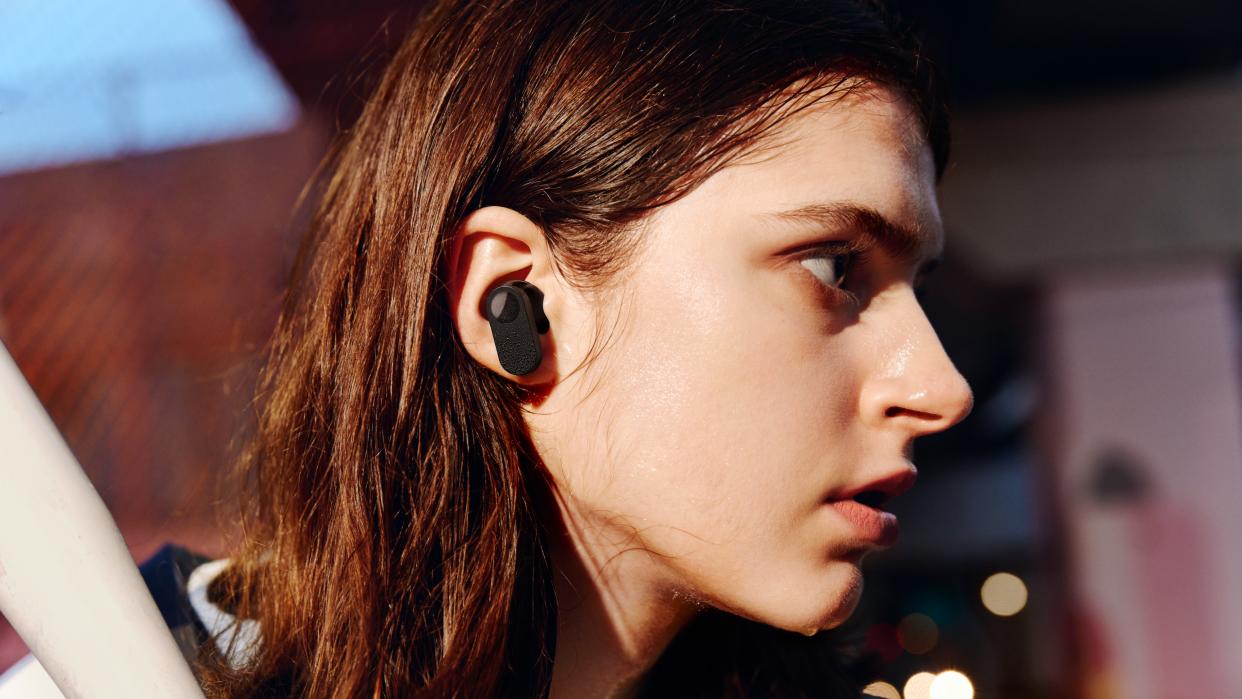  OnePlus Nord Buds review: woman wearing true wireless earbuds 