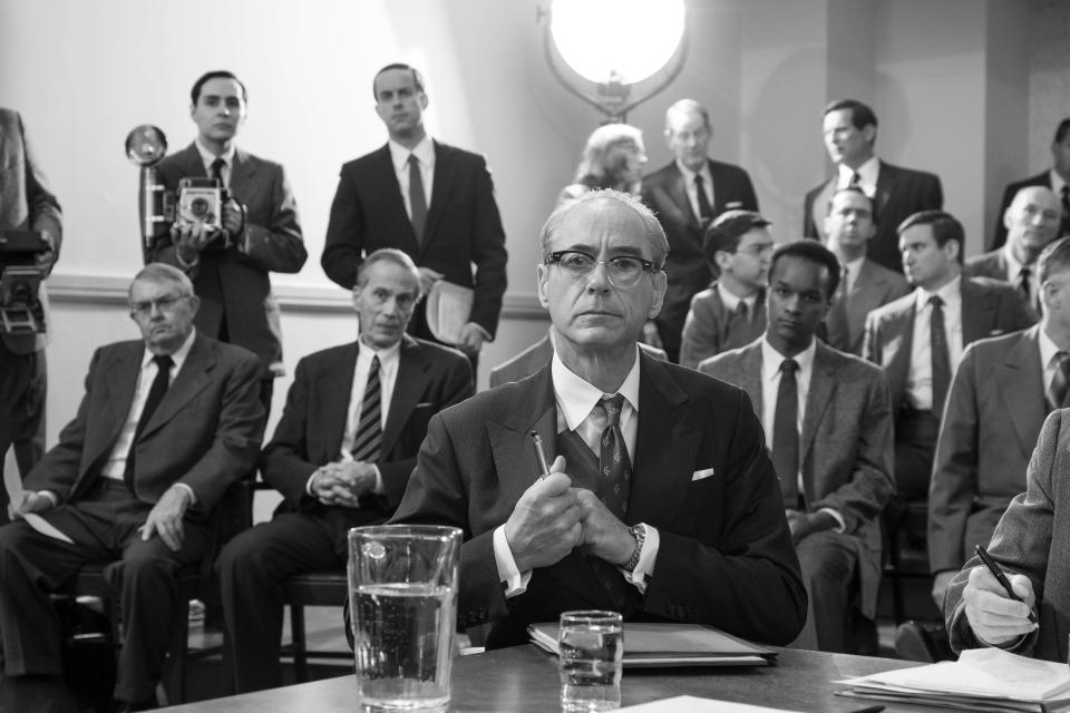 Robert Downey Jr. (center) plays Lewis Strauss, who goes through Senate hearings as part of his nomination for secretary of commerce in "Oppenheimer."