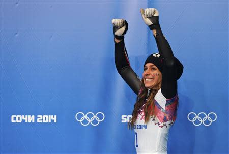 Noelle Pikus-Pace of the U.S. celebrates after winning second place in the women's skeleton event at the 2014 Sochi Winter Olympics, at the Sanki Sliding Center in Rosa Khutor February 14, 2014. REUTERS/Murad Sezer