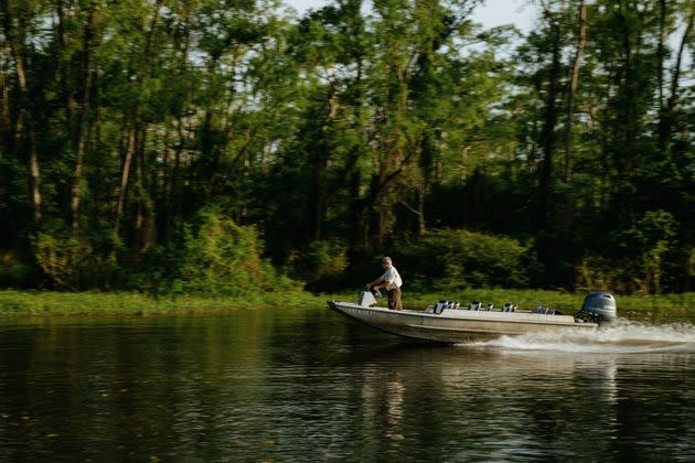 Dean Wilson, head of the Atchafalaya Basinkeeper, guides his boat through human-made canals in the basin. (Photo: Bryan Tarnowski for HuffPost)