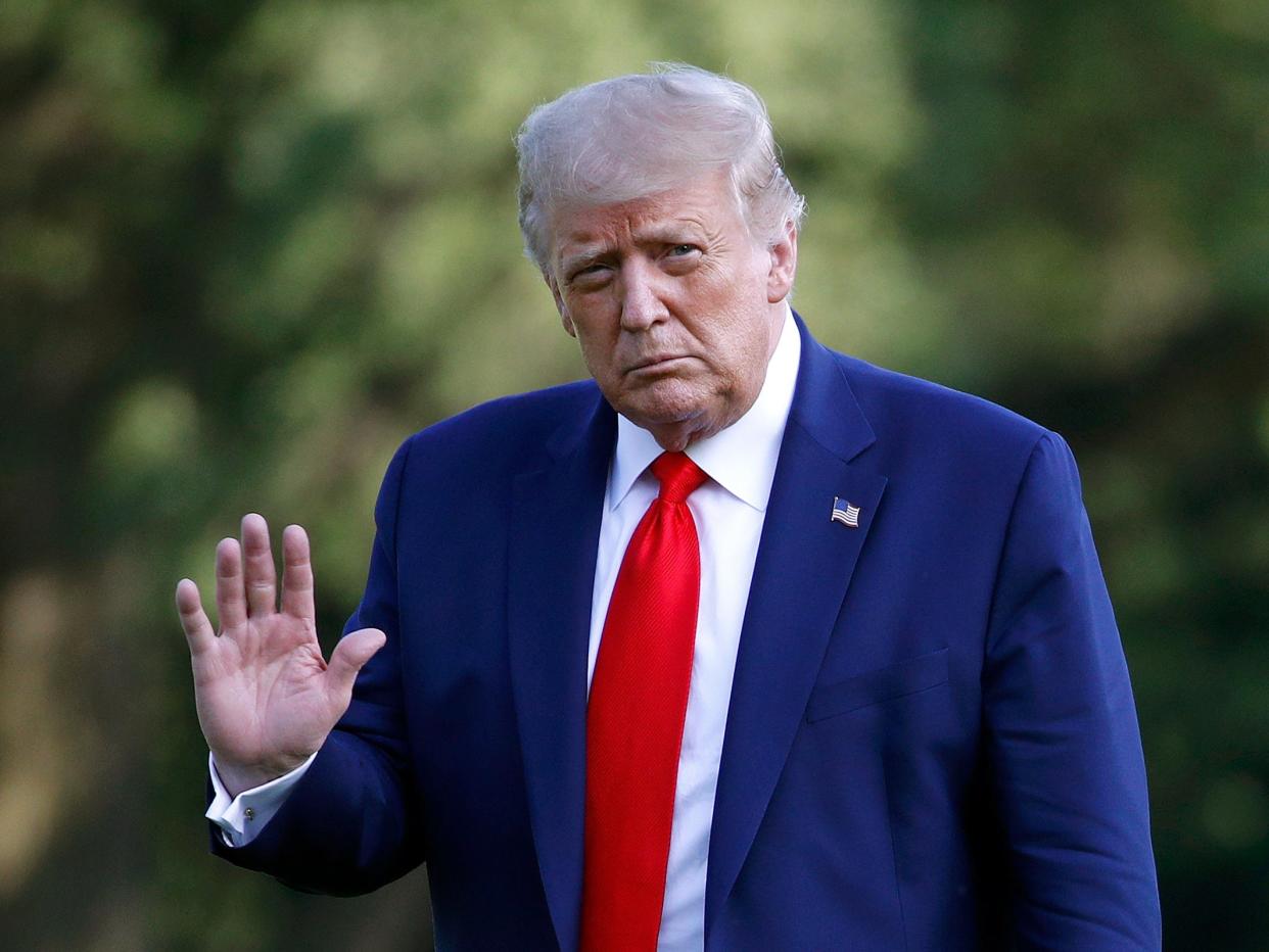 President Donald Trump walks on the South Lawn of the White House in Washington, Wednesday, July 15, 2020, after stepping off Marine One. Trump is returning from Atlanta. (AP Photo/Patrick Semansky)