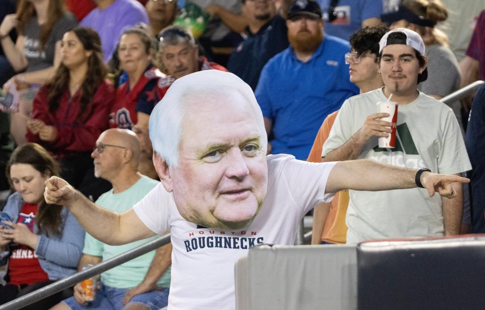 A Houston Roughnecks fan dances while wearing a head coach Wade Phillips mask during the Roughnecks' win over the Arlington Renegades.