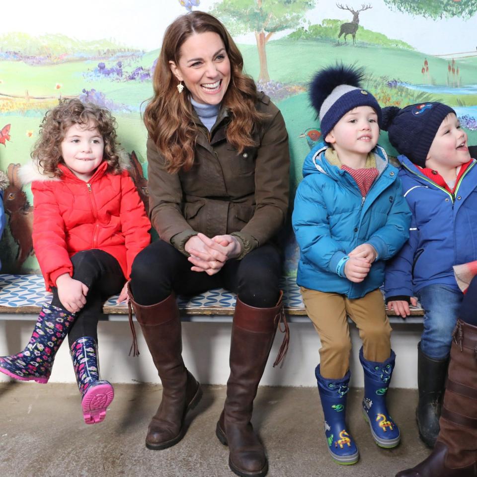 The Princess of Wales with children on a visit to a nursery in Northern Ireland