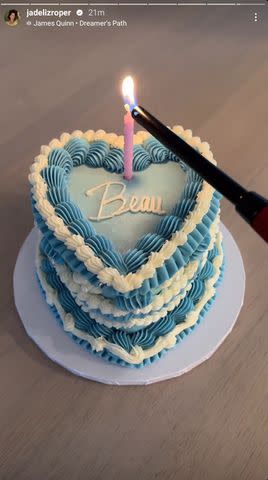 <p>Jade Roper Tolbert/Instagram</p> Jade Roper Tolbert lighting cake for late son Beau