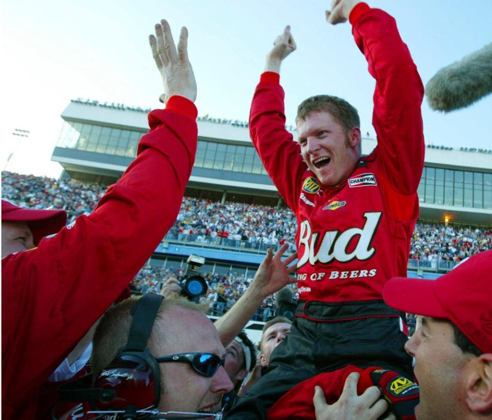 Earnhardt celebrates with his crew after winning the 2004 Daytona 500 (Kelly Jordan/The Daytona Beach News-Journal via AP, File)