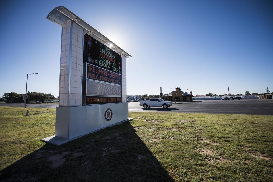 A sign outside of the John Ben Shepperd Public Leadership Institute reads "Welcome HuffPost Listen To America Tour."