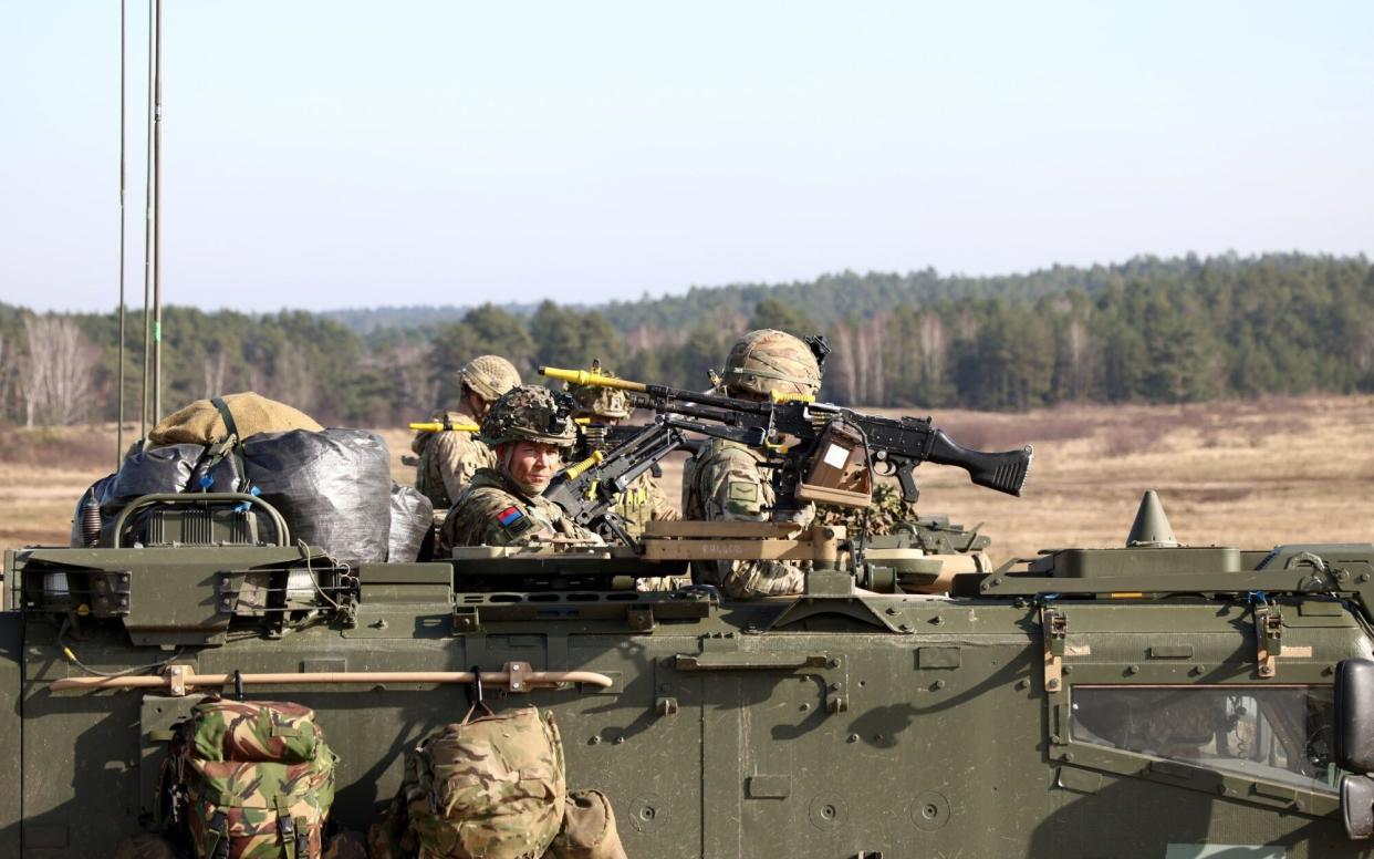 British army soldiers on a Foxhound protected patrol vehicle during the North Atlantic Treaty Organization (NATO) Brilliant Jump 2024