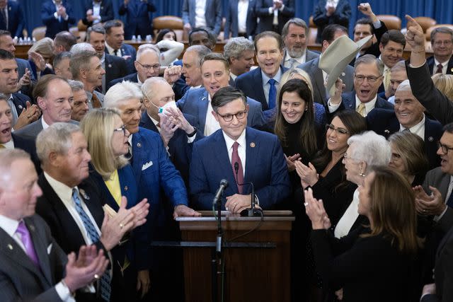 <p>Tom Brenner for The Washington Post via Getty </p> Mike Johnson addresses House Republicans after getting nominated for the speakership on Oct. 24, 2023