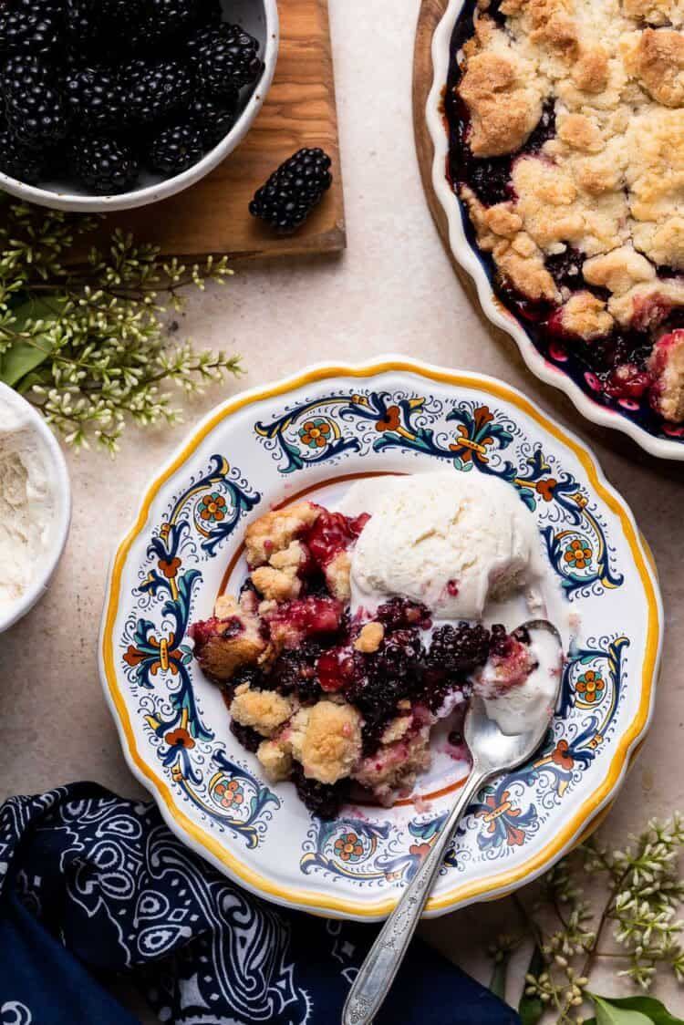 <p>The perfect solution to using up lots and lots of blackberries...make a crumble! This recipe nestles blackberries in a cake-like crumble topping which tastes perfect with ice cream.</p><p>Get the <a href="https://kitchenconfidante.com/blackberry-crumble" rel="nofollow noopener" target="_blank" data-ylk="slk:Blackberry Crumble;elm:context_link;itc:0;sec:content-canvas" class="link ">Blackberry Crumble</a> recipe.</p><p>Recipe from <a href="https://kitchenconfidante.com/" rel="nofollow noopener" target="_blank" data-ylk="slk:Kitchen Confidante;elm:context_link;itc:0;sec:content-canvas" class="link ">Kitchen Confidante</a>. </p>