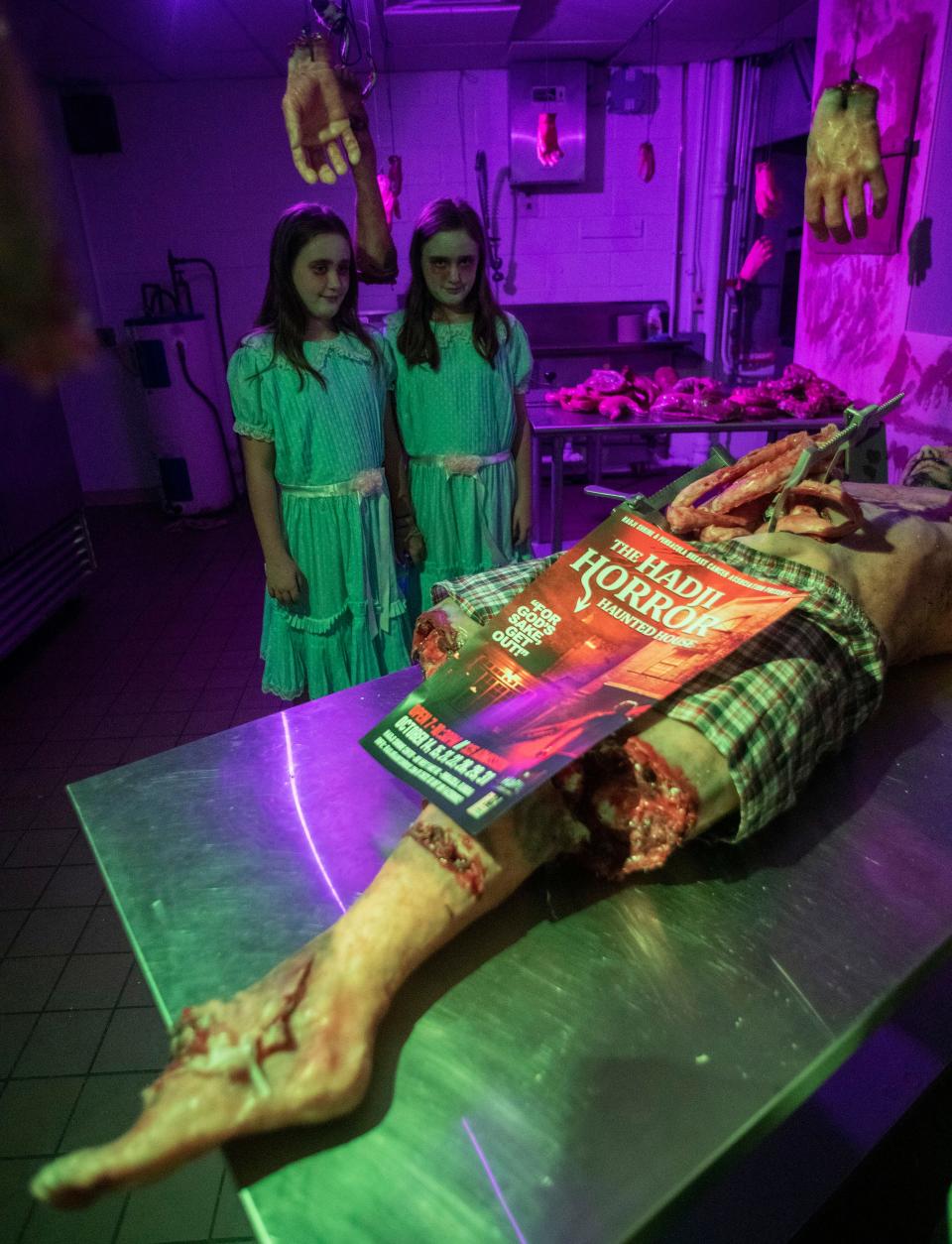 The Webster twins, Rylan and Karsyn, haunt the Hadji Shrine's Horror Haunted House in Pensacola on Saturday, Oct. 8, 2022.